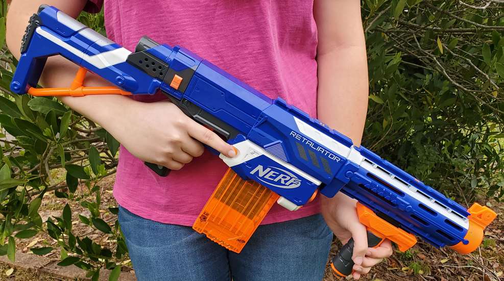 Child Holding Nerf Gun