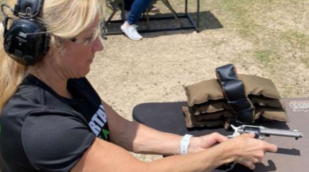 Woman With Single Action Revolver