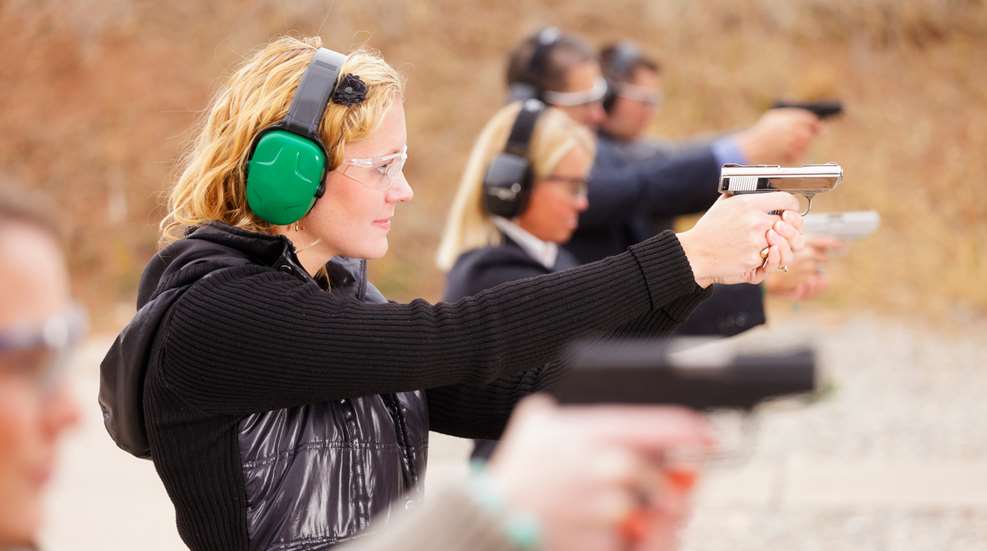 Woman Green Ear Protection At Range