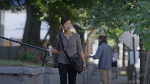 Woman Walking With Concealed Carry Purse