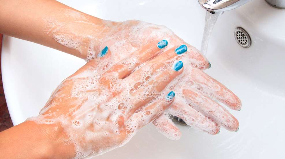 Woman Washing Hands Teal Nail Polish