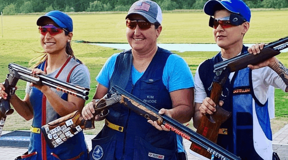 Women Holding Berettas