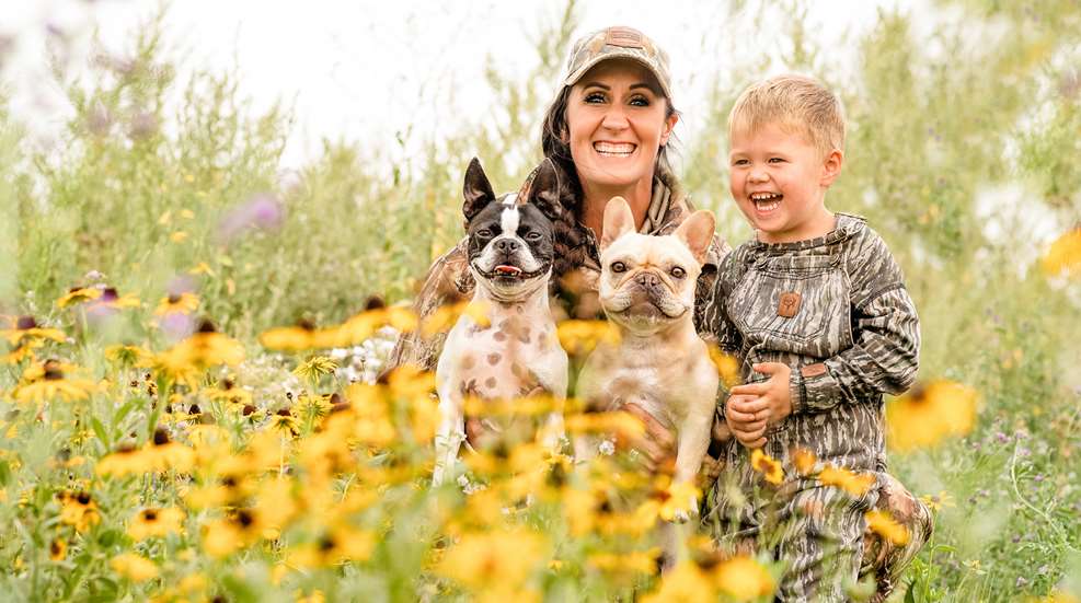 Bachman Son And Dogs In Flowers
