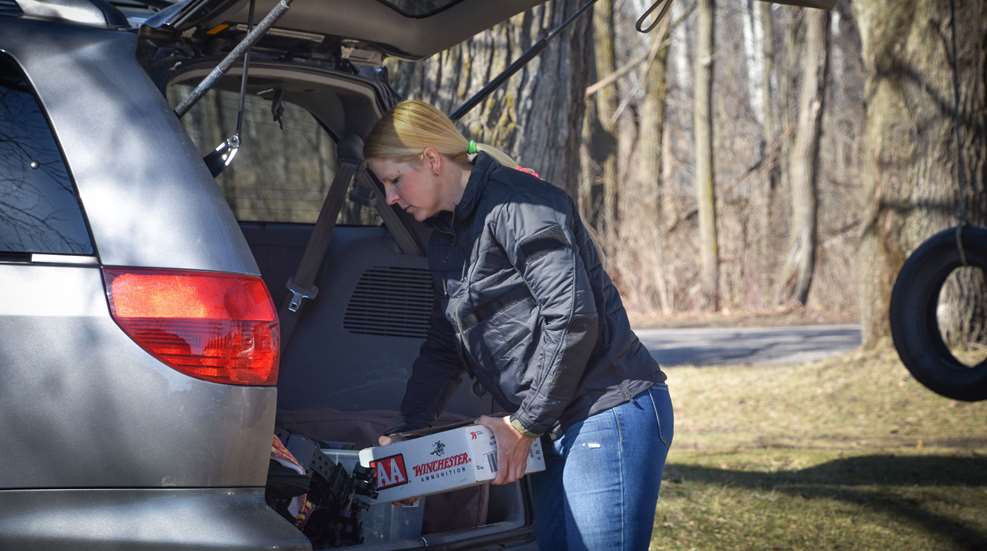 Becky Yackley Loading Ammo Into Van