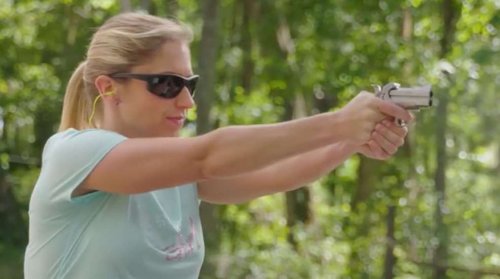 Woman Shooting Bond Arms Derringer