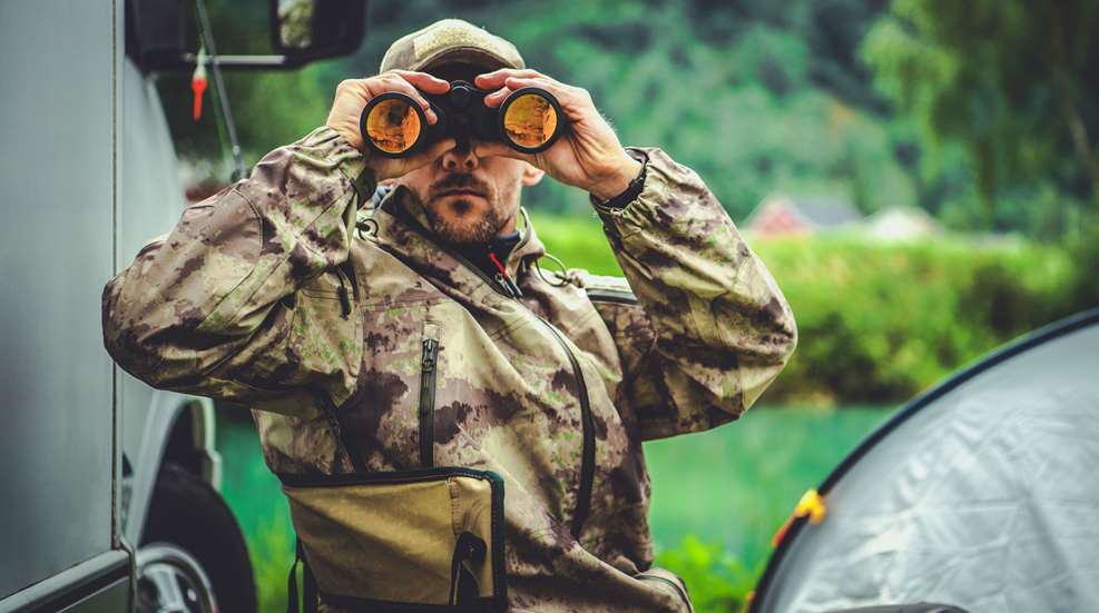 Hunter Looking Through Binocular