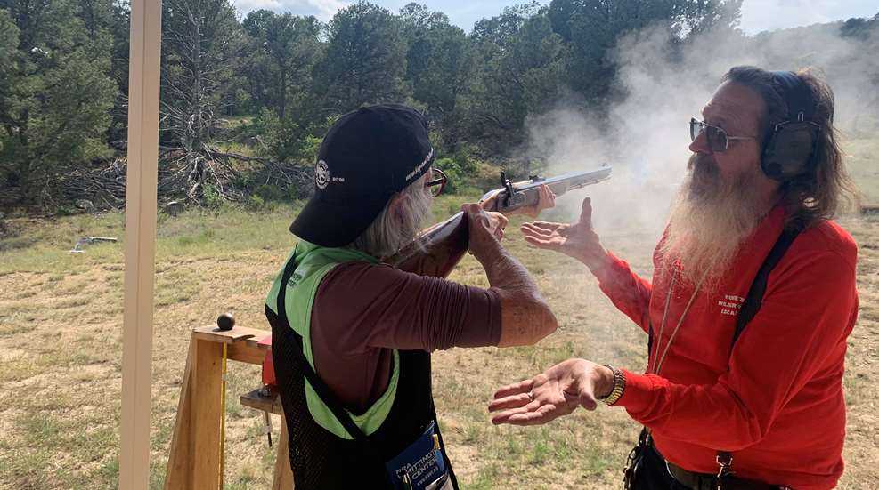 Woman Firing Muzzleloader