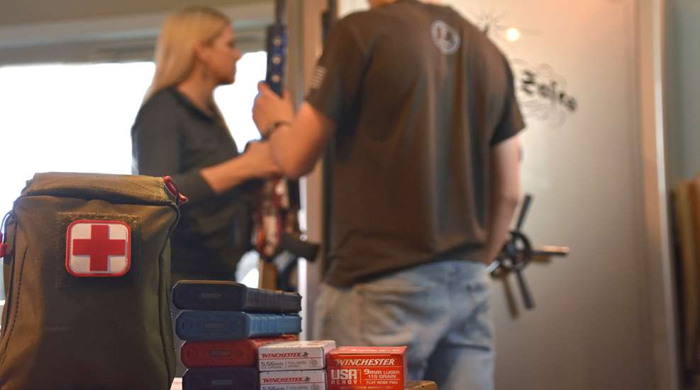 Couple With Emergecy Firearm Supplies