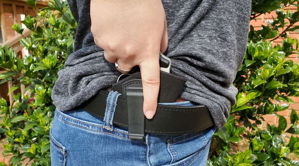Woman Drawing From Ccw Holster