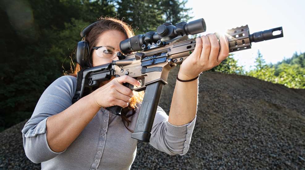 Woman Holding Cmmg Banshee