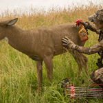 Melissa Bachman Spraying Decoy With Scent Killer