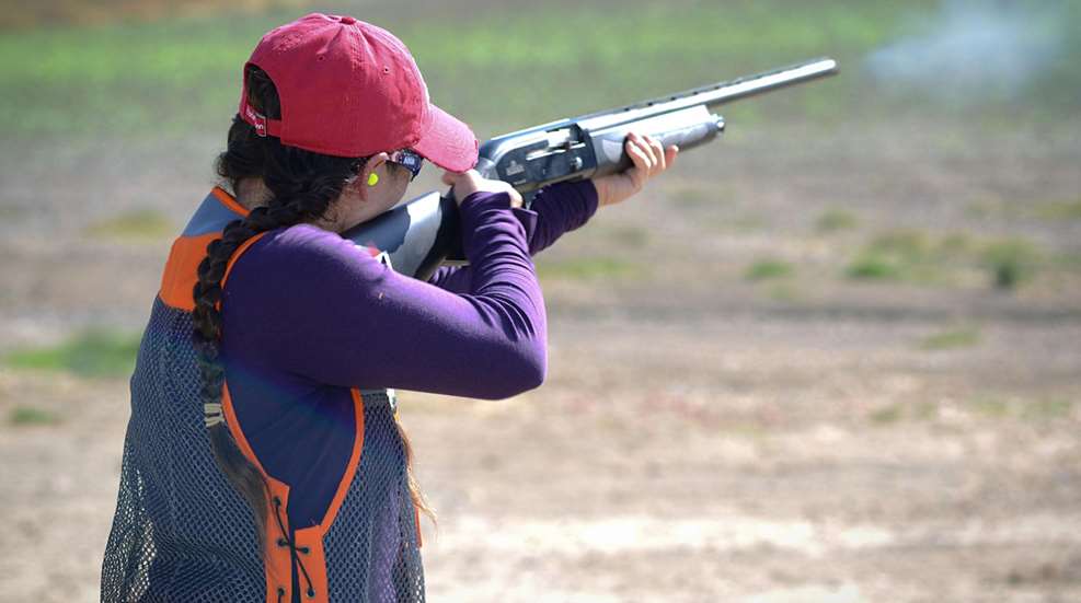 Woman Shooting Rifle