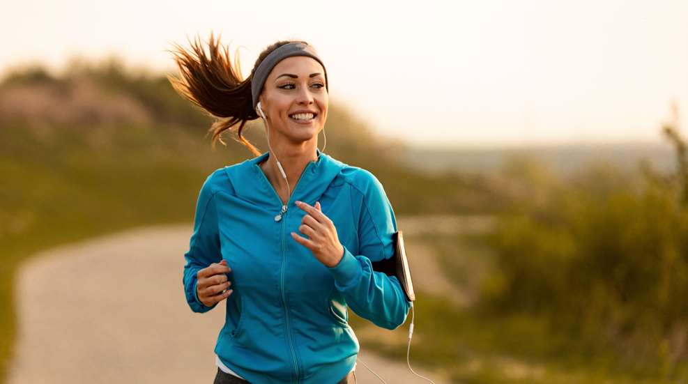 Woman Jogging With Headphones