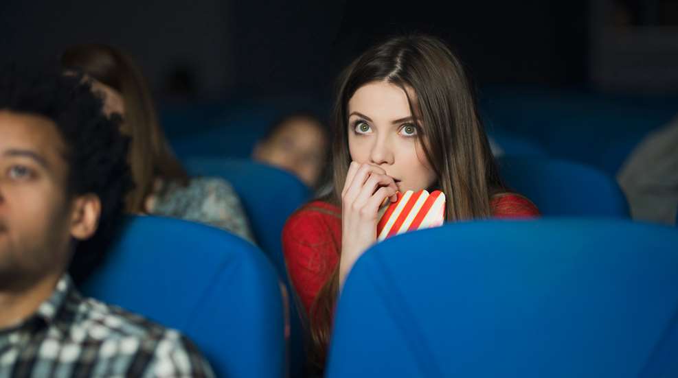 Woman Watching Scary Movie