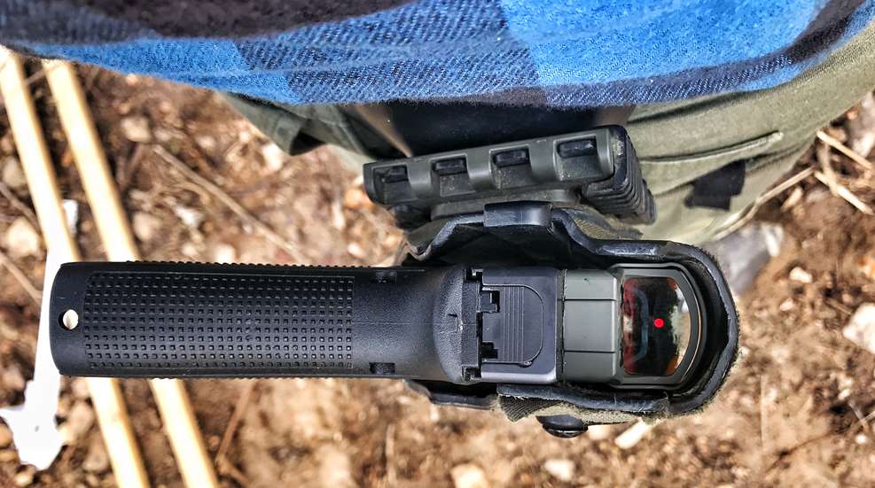 Conceled Carry Firearm In OWB Holster