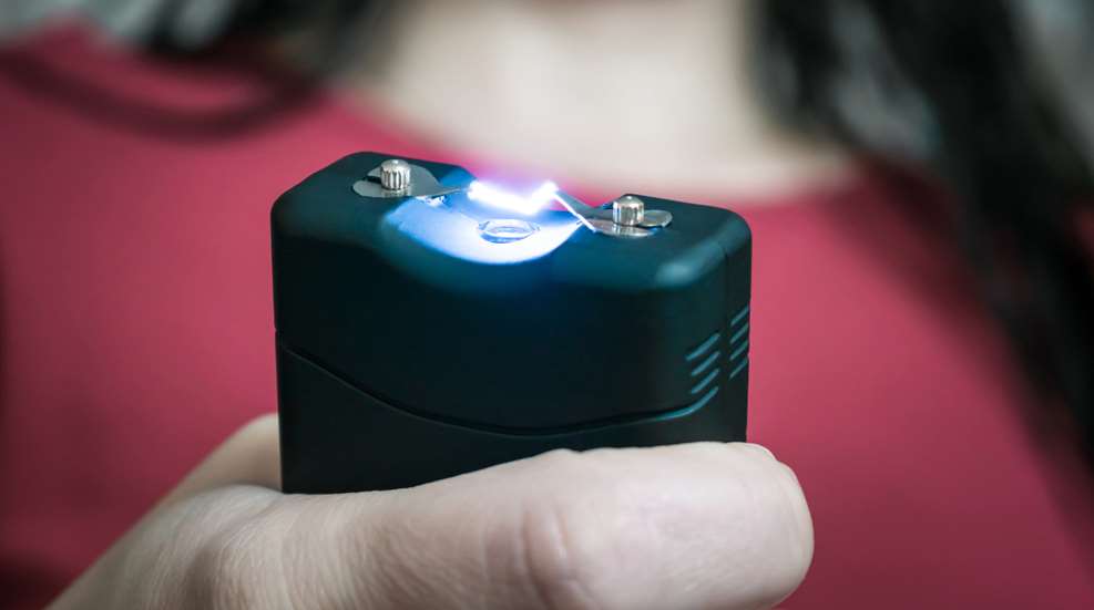 Woman Holding Stun Gun