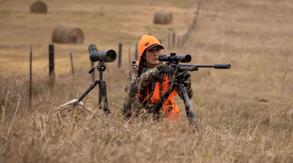 Bachman With Rifle On Shooting Tripod Afield