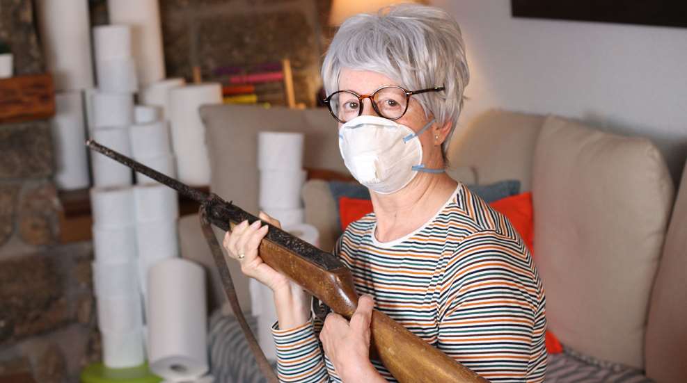 Woman Holding Rifle During Quarantine