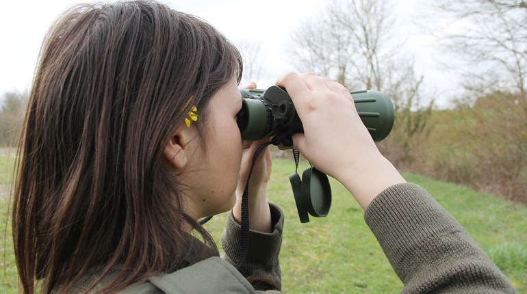 Deering Hunting Dilemma Woman Looking Through Binos