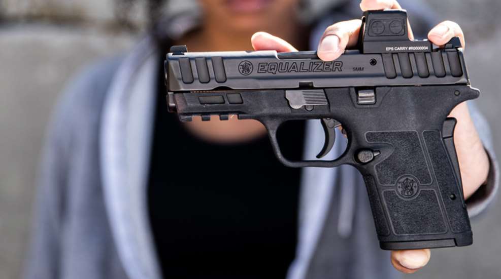 Smith Wesson Equalizer Woman Holding