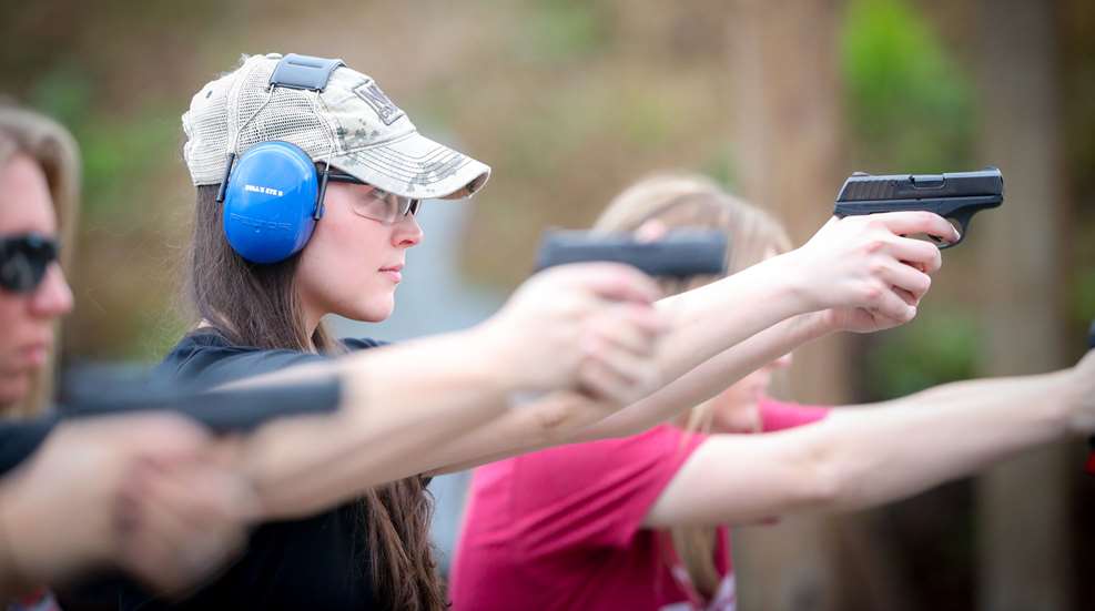 Women Shooting On Line