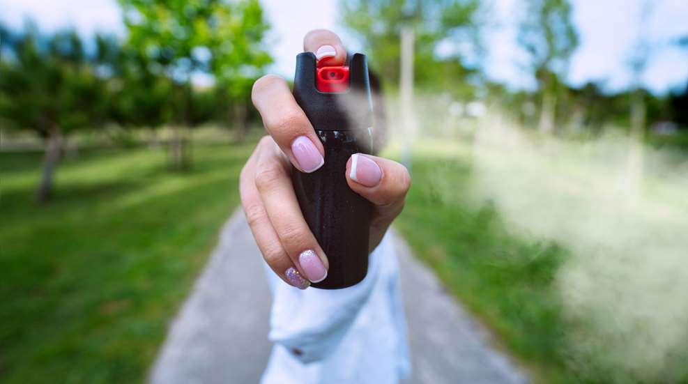 Pepper Spray Womans Hand