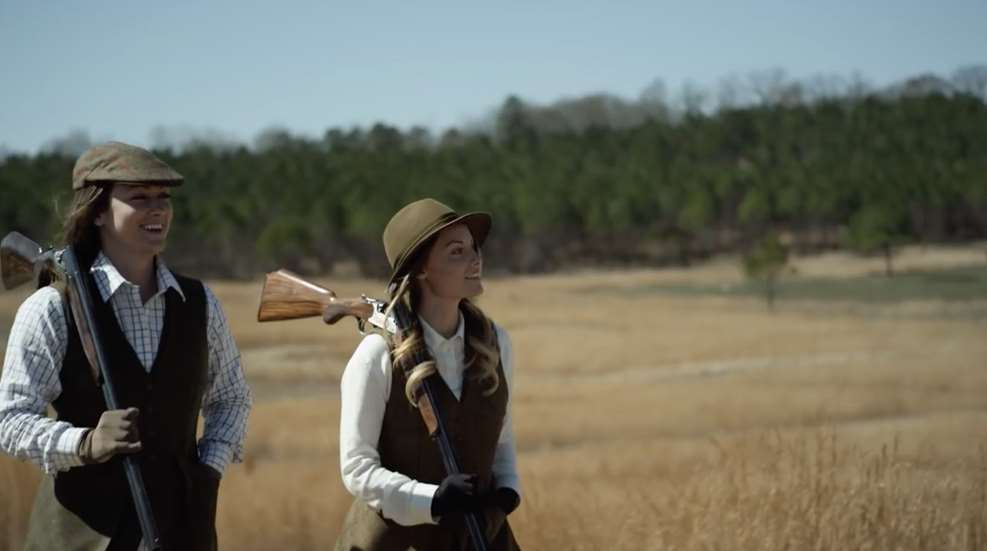 Women In Field With Shotguns