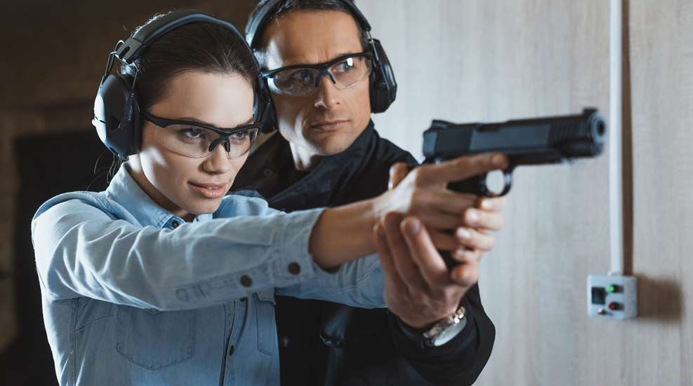 Woman At Range With Man
